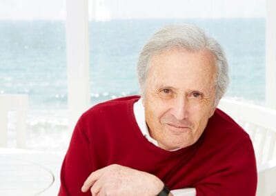 A man wearing a red sweater.