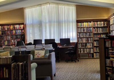 Library with computers and bookshelves