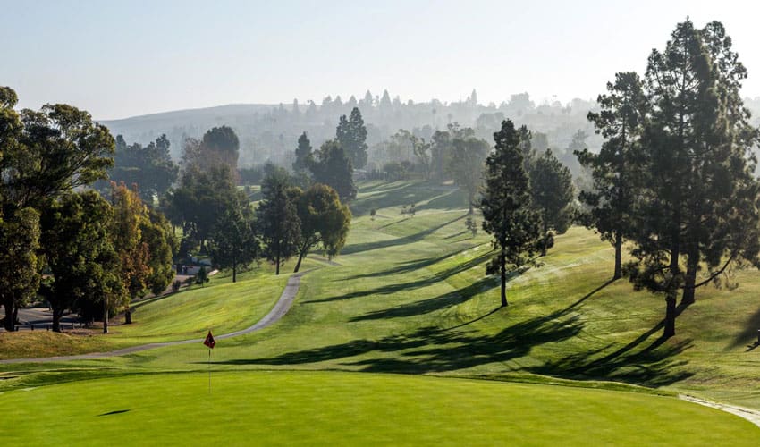 An aerial view of a golf course in california.